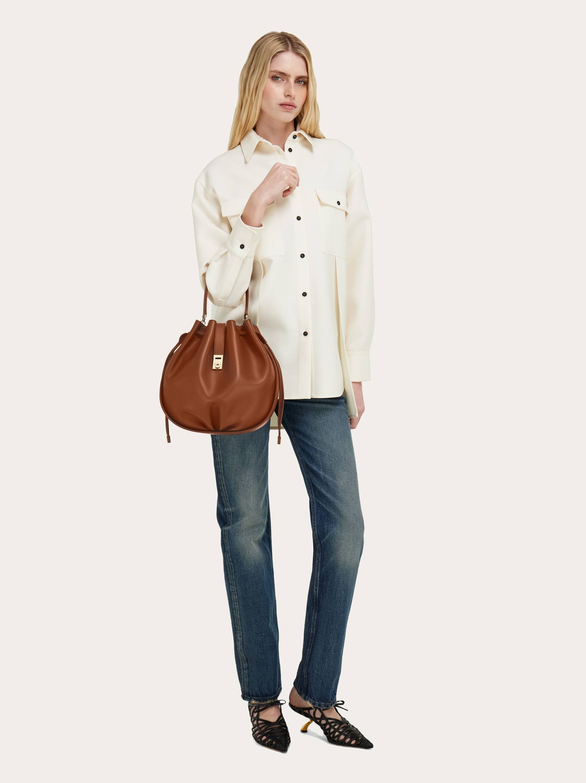 Ferragamo Hug Buckle Leather Bucket Bag In Brown